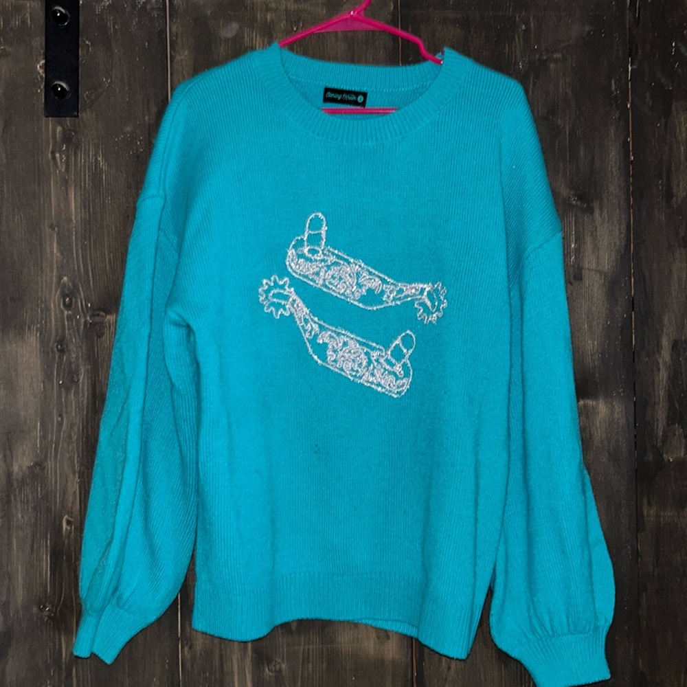 Turqouise Tinsel Spurs Sweater